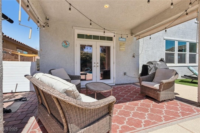 view of patio / terrace featuring french doors
