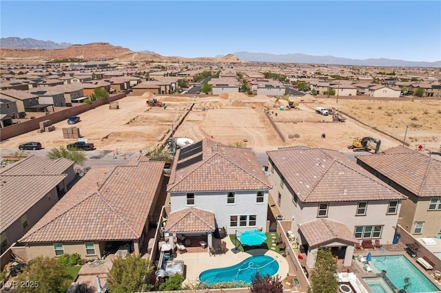 aerial view with a mountain view and a residential view