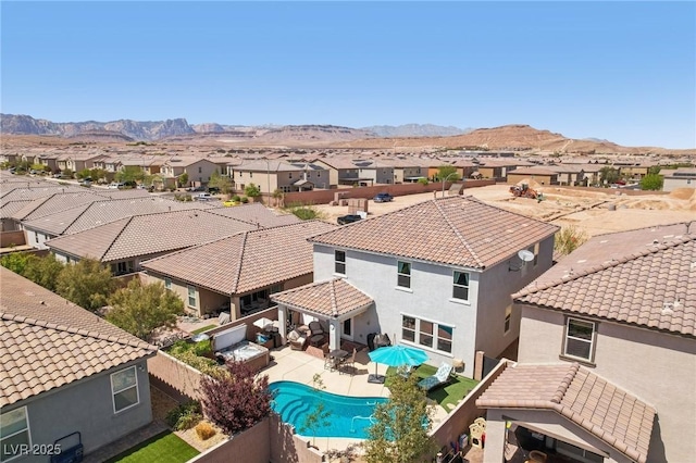 birds eye view of property featuring a residential view and a mountain view
