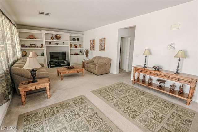 living room with carpet floors and visible vents