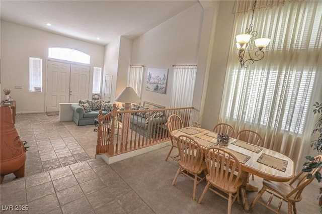 dining area with recessed lighting and a chandelier