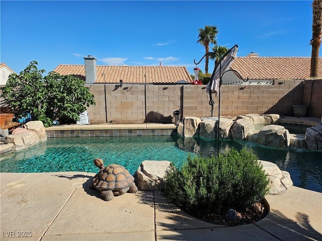 view of swimming pool featuring a fenced backyard and a fenced in pool