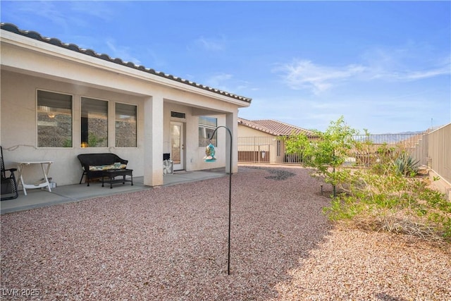 3491 Cottage Thistle Dr, Laughlin, NV 89029 - exterior space with a fenced backyard and a patio area
