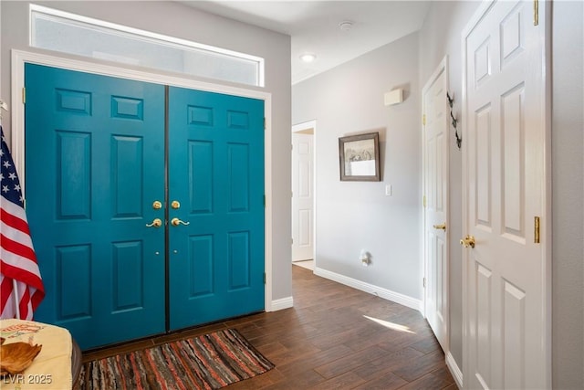 3491 Cottage Thistle Dr, Laughlin, NV 89029 - entrance foyer with dark wood-style floors and baseboards