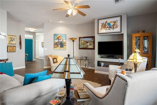 3491 Cottage Thistle Dr, Laughlin, NV 89029 - living room featuring baseboards, visible vents, wood finished floors, and ceiling fan