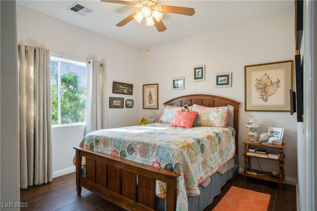 3491 Cottage Thistle Dr, Laughlin, NV 89029 - bedroom featuring wood finished floors, baseboards, ceiling fan, and visible vents