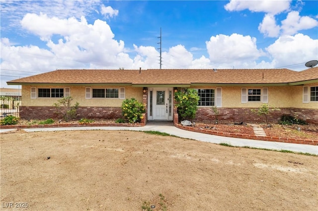 4678 Saddle Pl, Las Vegas, NV 89119 - single story home featuring brick siding and stucco siding