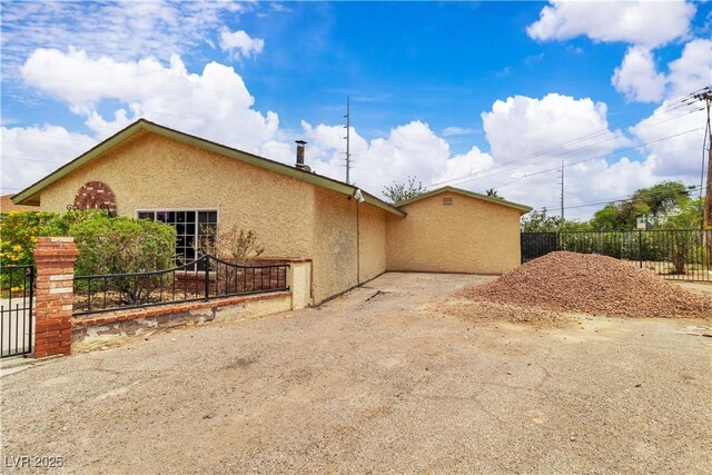 4678 Saddle Pl, Las Vegas, NV 89119 - view of property exterior with stucco siding
