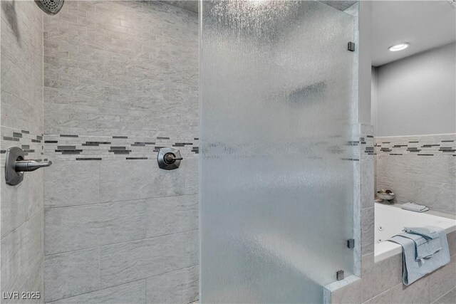 4678 Saddle Pl, Las Vegas, NV 89119 - full bathroom with a shower stall and a jetted tub