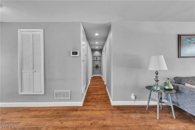 4678 Saddle Pl, Las Vegas, NV 89119 - hallway featuring wood finished floors, baseboards, and recessed lighting