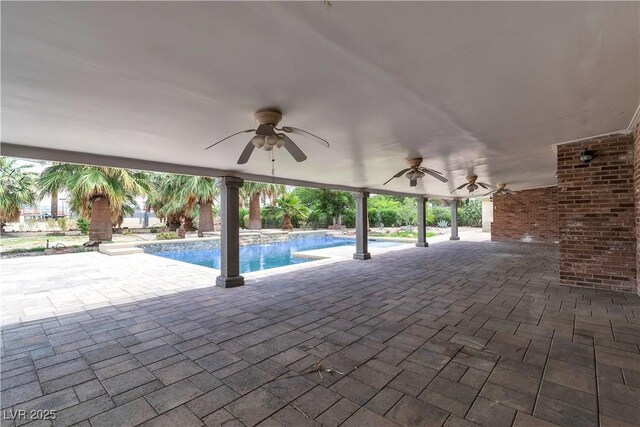4678 Saddle Pl, Las Vegas, NV 89119 - view of patio / terrace featuring ceiling fan and an outdoor pool