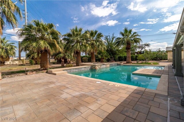 4678 Saddle Pl, Las Vegas, NV 89119 - swimming pool with a patio area