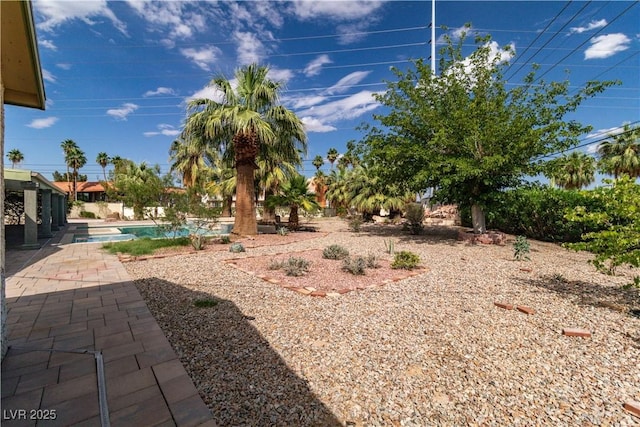 4678 Saddle Pl, Las Vegas, NV 89119 - view of yard with an outdoor pool and a patio area