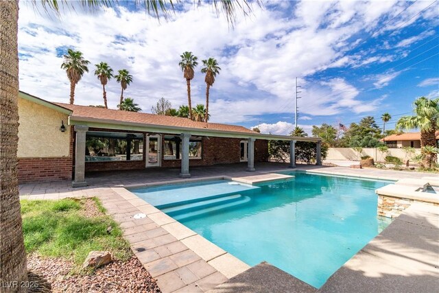 4678 Saddle Pl, Las Vegas, NV 89119 - view of swimming pool featuring a patio area
