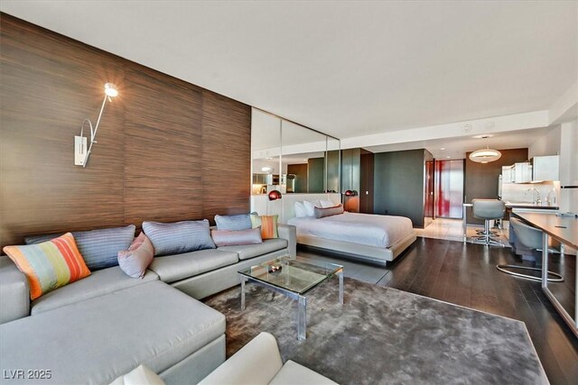 4381 W Flamingo Rd Unit 1609, Las Vegas, NV 89103 - bedroom featuring wood finished floors
