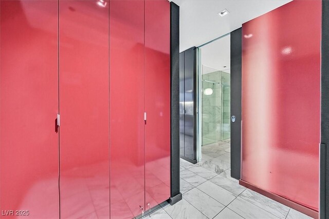 4381 W Flamingo Rd Unit 1609, Las Vegas, NV 89103 - hallway with marble finish floor