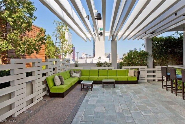 4381 W Flamingo Rd Unit 1609, Las Vegas, NV 89103 - view of patio / terrace featuring a pergola and an outdoor living space