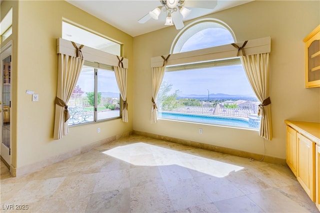 2212 Sierra Heights Dr, Las Vegas, NV 89134 - spare room with baseboards and ceiling fan