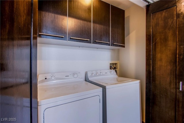 8925 W Flamingo Rd Unit 228, Las Vegas, NV 89147 - washroom featuring washing machine and clothes dryer and cabinet space