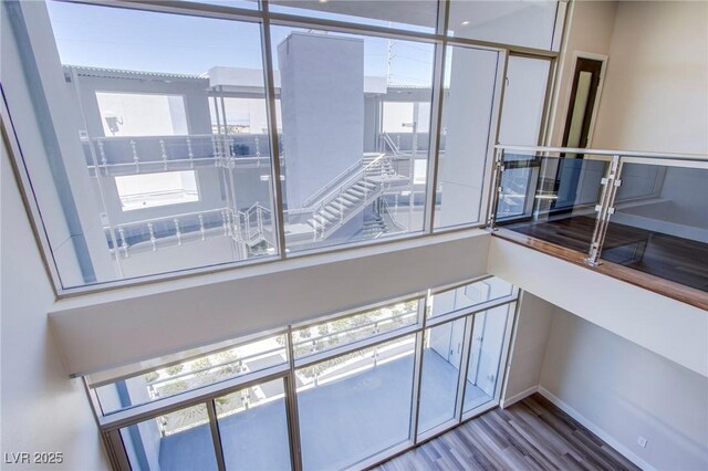 8925 W Flamingo Rd Unit 228, Las Vegas, NV 89147 - interior space featuring baseboards and wood finished floors