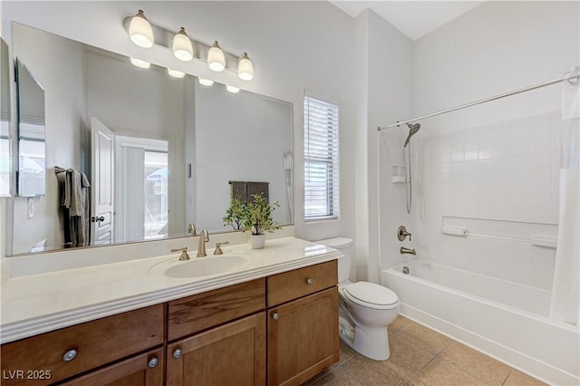 bathroom with shower / bath combo, tile patterned floors, vanity, and toilet