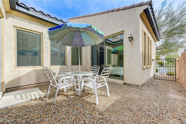view of patio / terrace with fence