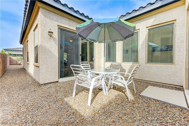 view of patio with fence