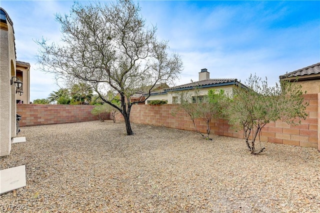 view of yard featuring a fenced backyard