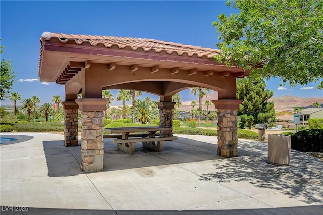 surrounding community with a patio