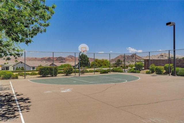 view of sport court with fence and community basketball court