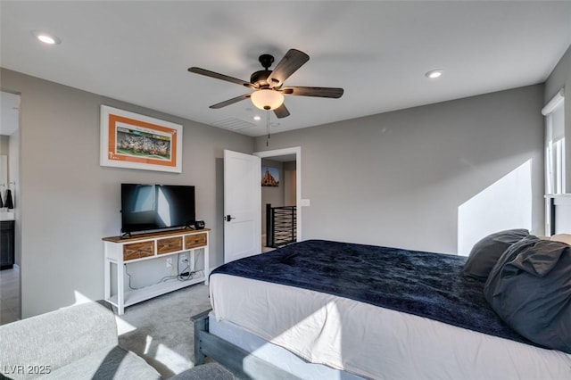 carpeted bedroom featuring recessed lighting and ceiling fan