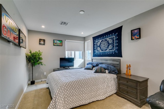 bedroom with recessed lighting, baseboards, light colored carpet, and visible vents