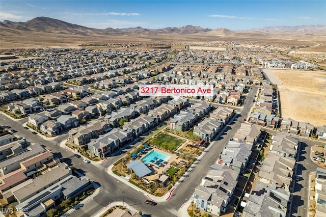 aerial view with a residential view and a mountain view