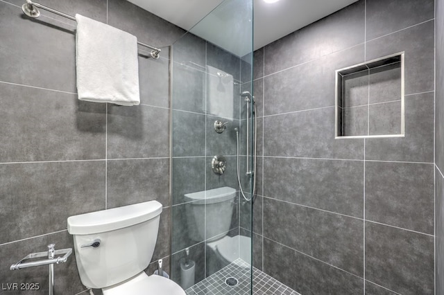 205 E Harmon Ave Unit 1007, Las Vegas, NV 89169 - full bathroom featuring a tile shower and toilet