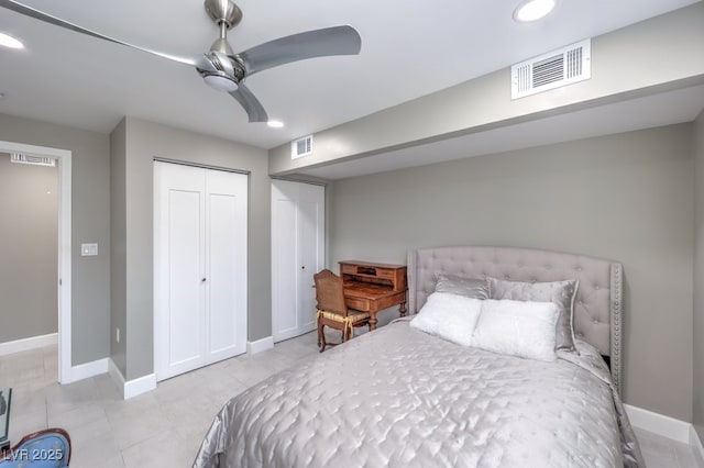tiled bedroom featuring baseboards, visible vents, and recessed lighting