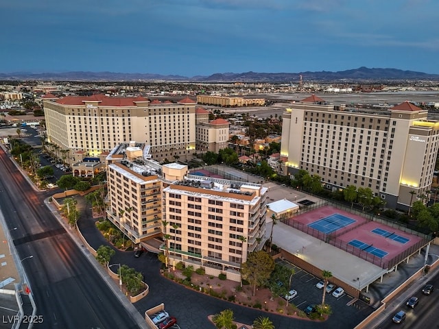 bird's eye view with a city view and a mountain view