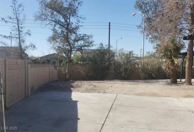 3711 Southern Light Dr, Las Vegas, NV 89115 - view of yard featuring fence and a patio