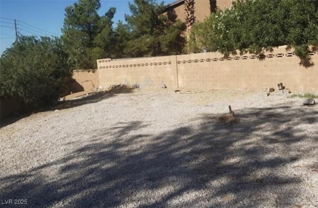 3711 Southern Light Dr, Las Vegas, NV 89115 - view of yard featuring fence