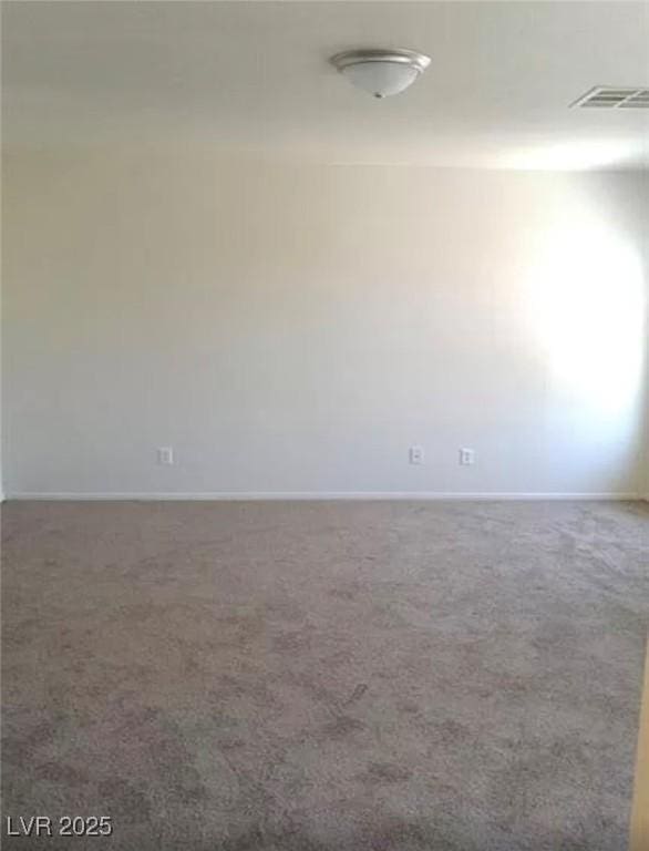 3883 Winter Whitetail St, Las Vegas, NV 89122 - carpeted empty room with baseboards and visible vents
