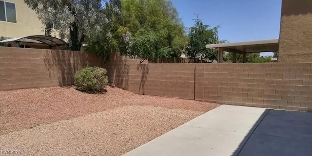 3883 Winter Whitetail St, Las Vegas, NV 89122 - view of yard with a fenced backyard and a patio