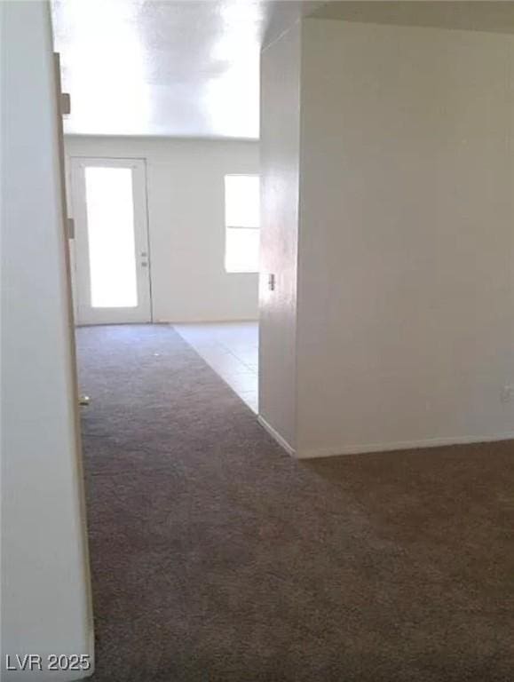3883 Winter Whitetail St, Las Vegas, NV 89122 - corridor featuring carpet floors
