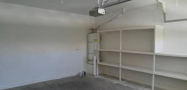 3883 Winter Whitetail St, Las Vegas, NV 89122 - garage with water heater and a garage door opener