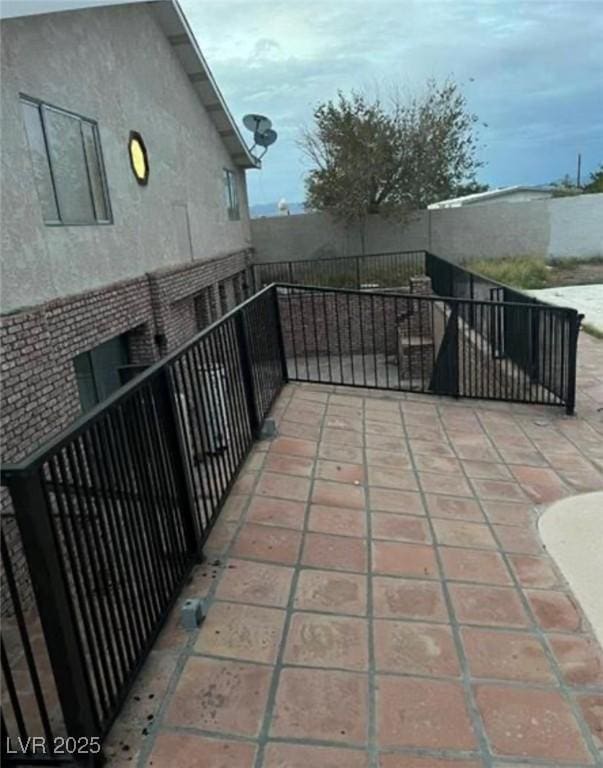 664 Sky Rd, Indian Springs, NV 89018 - view of patio with a balcony