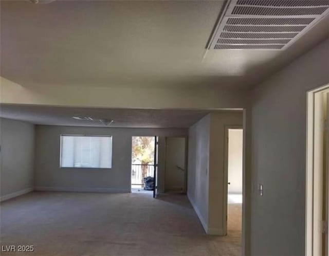 664 Sky Rd, Indian Springs, NV 89018 - spare room featuring baseboards and visible vents