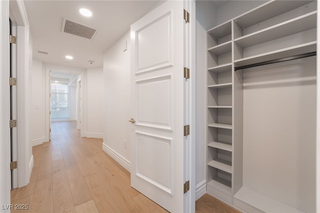 closet featuring visible vents