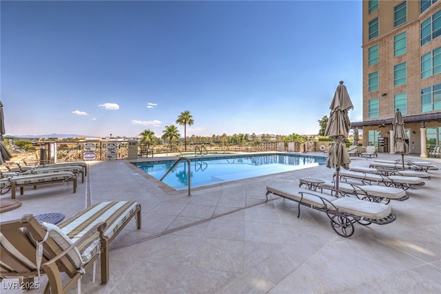 pool featuring a patio area