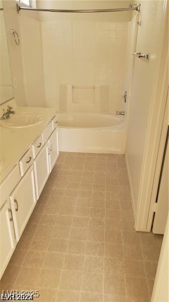 full bathroom featuring tub / shower combination and vanity