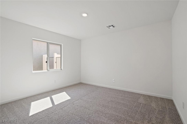 2618 Lily Point St, Las Vegas, NV 89156 - carpeted empty room with baseboards and recessed lighting