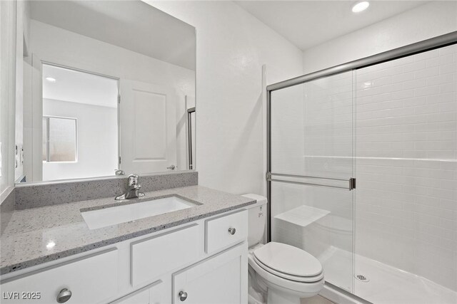 2618 Lily Point St, Las Vegas, NV 89156 - full bathroom with toilet, vanity, a stall shower, and recessed lighting