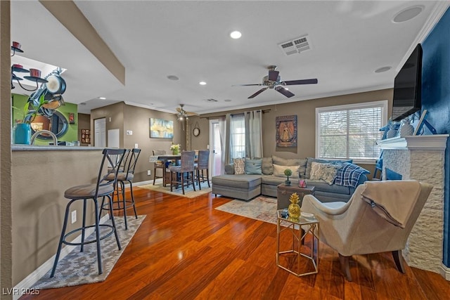 8600 W Charleston Blvd Unit 2078, Las Vegas, NV 89117 - living area with a ceiling fan, wood finished floors, ornamental molding, baseboards, and recessed lighting